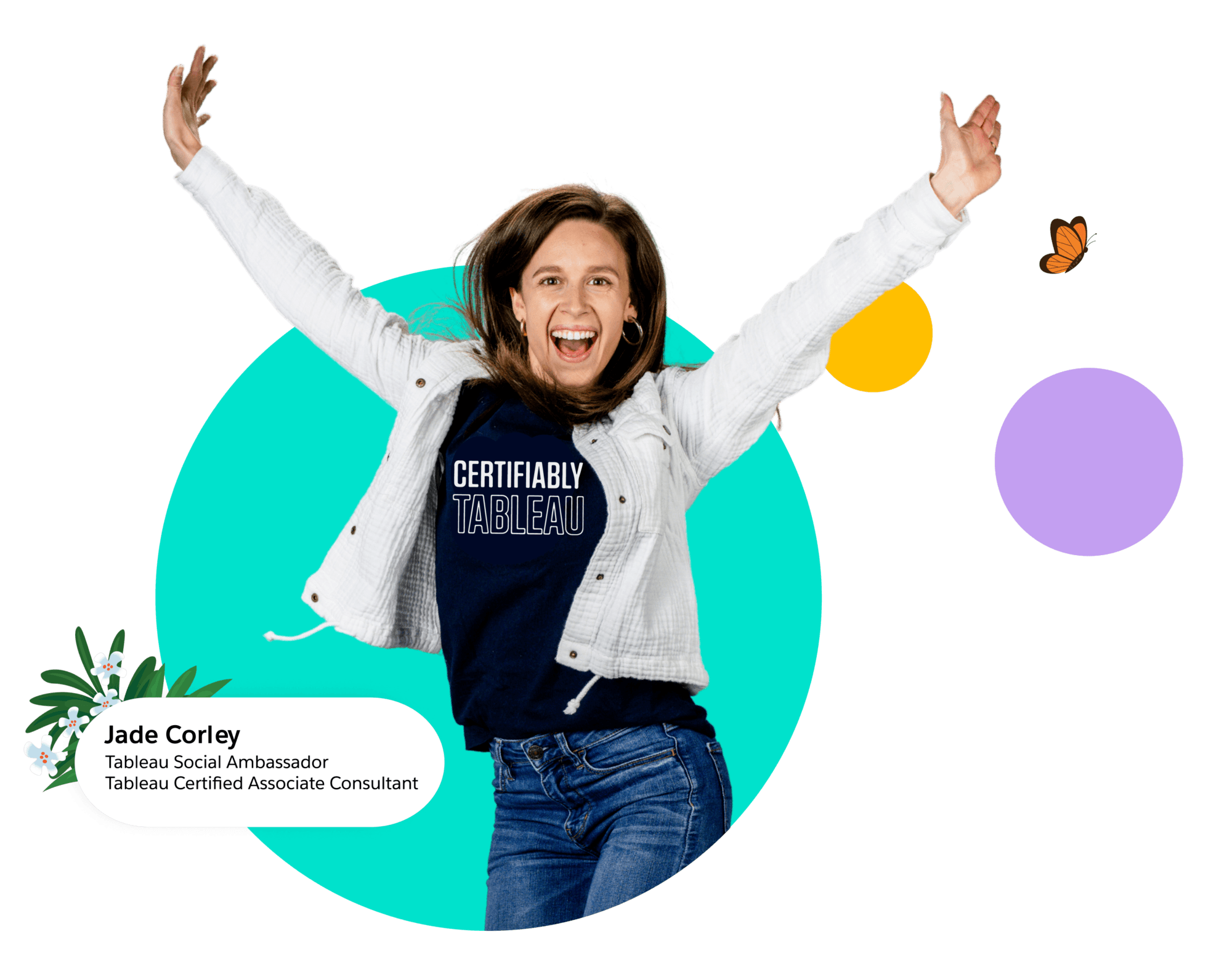 Tableau Social Ambassador Jade Corley jumping and smiling wearing a Certifiably Tableau shirt with bright colored bubble images